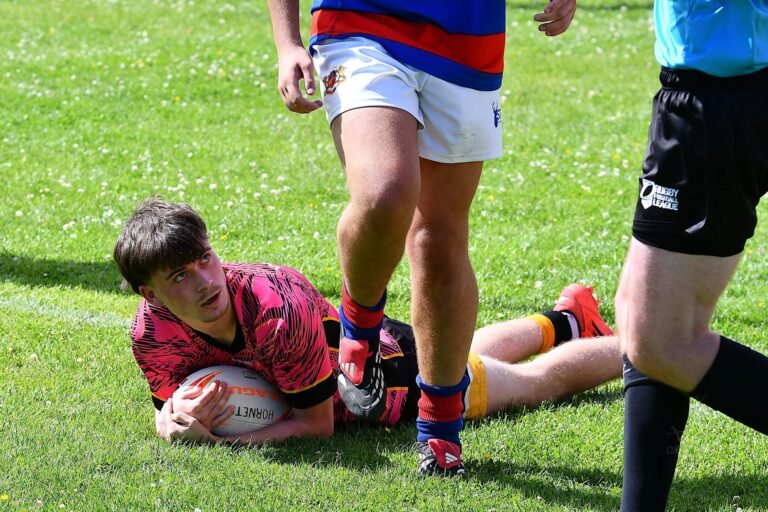 An Aspatria Hornets player grounding the ball over the line