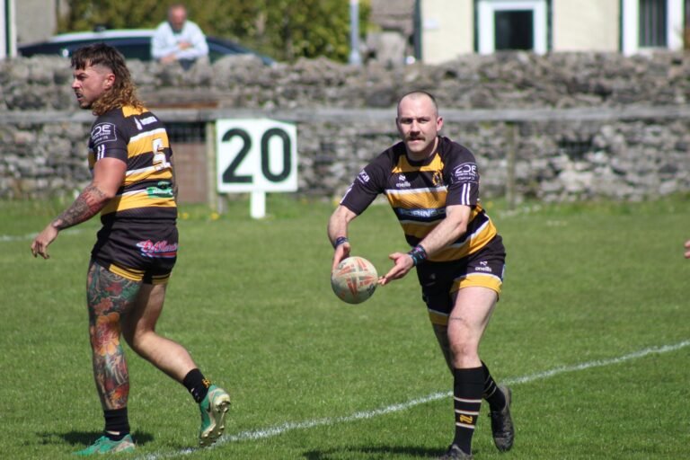 An Aspatria Hornets player looking for support with ball in hand